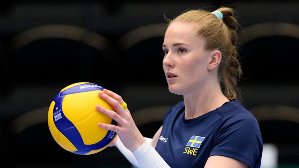Explain how female volleyball players inspire young athletes around the world.